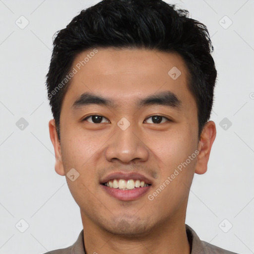 Joyful latino young-adult male with short  black hair and brown eyes