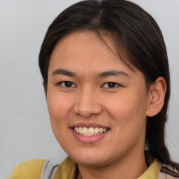 Joyful white young-adult female with medium  brown hair and brown eyes