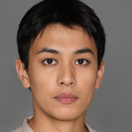 Neutral asian young-adult male with short  brown hair and brown eyes