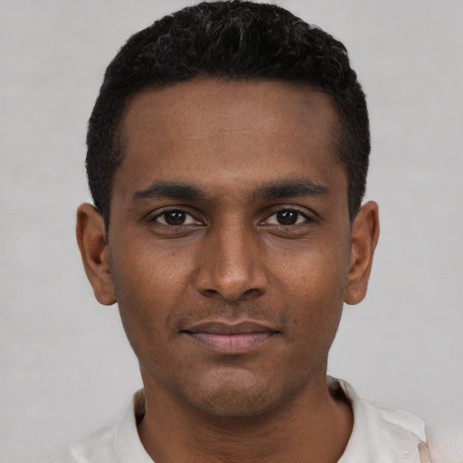 Neutral black young-adult male with short  black hair and brown eyes
