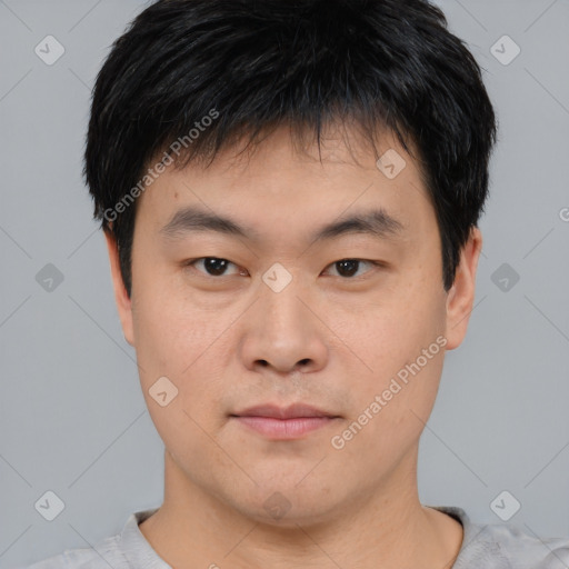 Neutral asian young-adult male with short  black hair and brown eyes