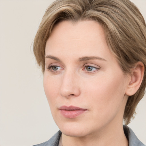 Neutral white young-adult female with medium  brown hair and grey eyes