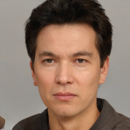 Neutral white adult male with short  brown hair and brown eyes