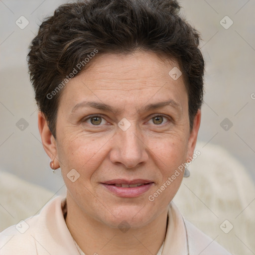 Joyful white adult female with short  brown hair and brown eyes