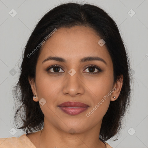 Joyful latino young-adult female with medium  brown hair and brown eyes