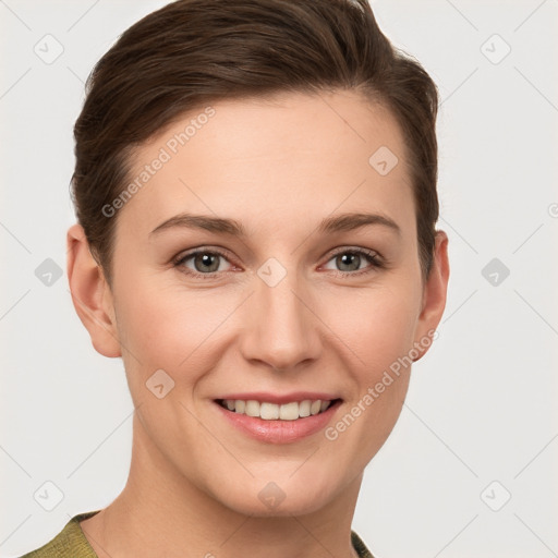 Joyful white young-adult female with short  brown hair and grey eyes