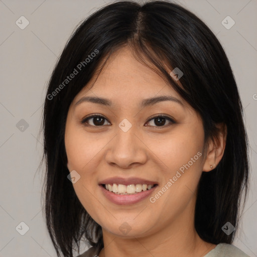 Joyful asian young-adult female with medium  brown hair and brown eyes