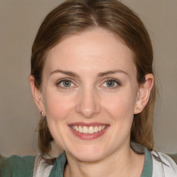 Joyful white young-adult female with medium  brown hair and blue eyes