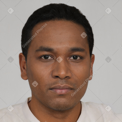 Neutral black young-adult male with short  black hair and brown eyes