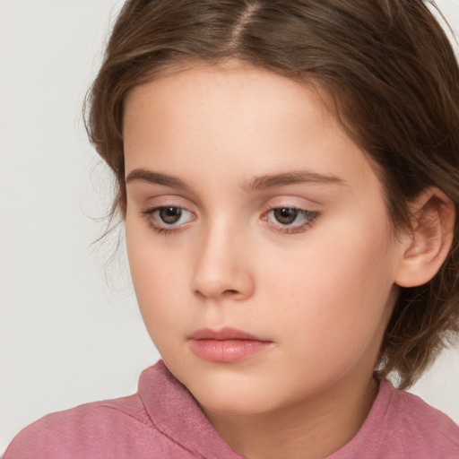 Neutral white child female with medium  brown hair and brown eyes