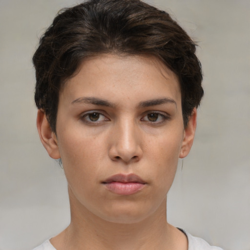 Neutral white young-adult female with short  brown hair and brown eyes