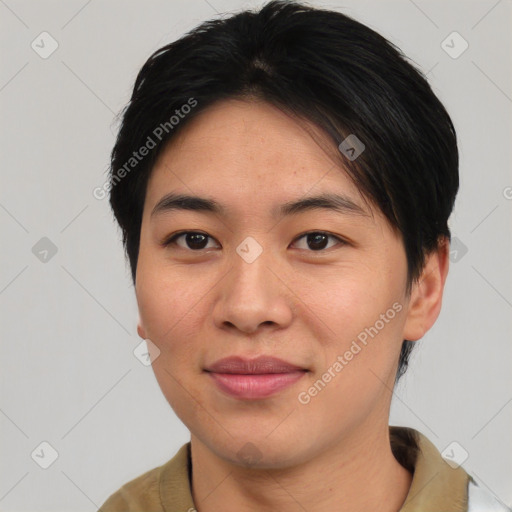 Joyful asian young-adult female with short  brown hair and brown eyes