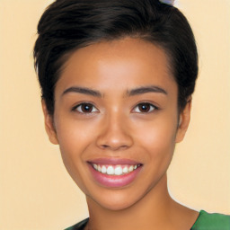 Joyful latino young-adult female with short  black hair and brown eyes