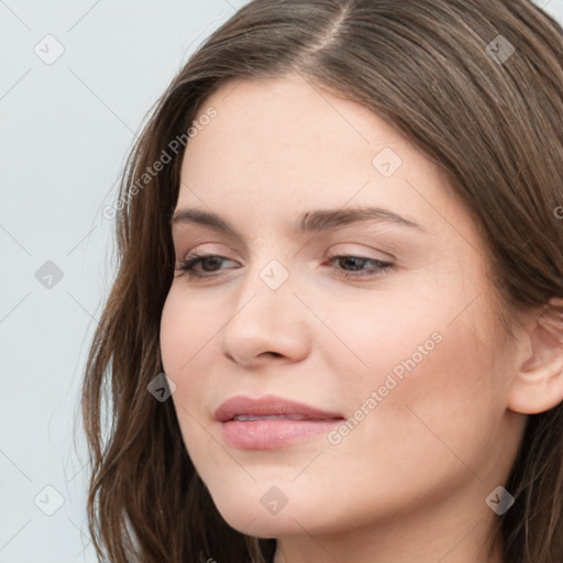 Neutral white young-adult female with long  brown hair and grey eyes