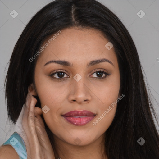 Joyful asian young-adult female with long  brown hair and brown eyes