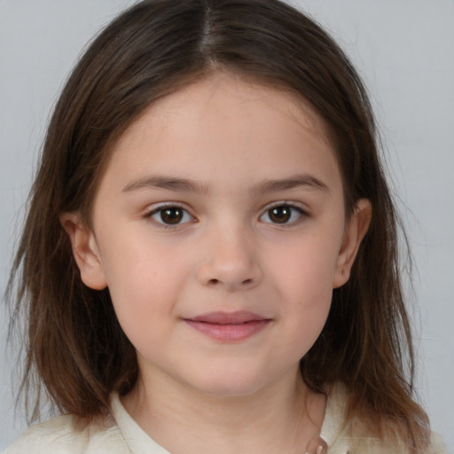 Joyful white child female with medium  brown hair and brown eyes