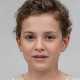 Joyful white child female with short  brown hair and brown eyes