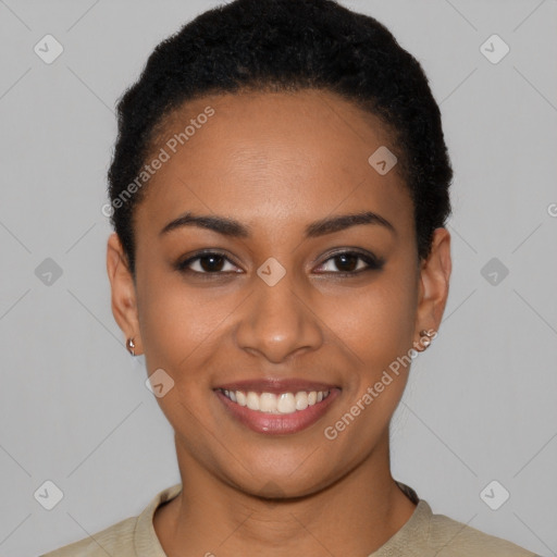 Joyful latino young-adult female with short  black hair and brown eyes