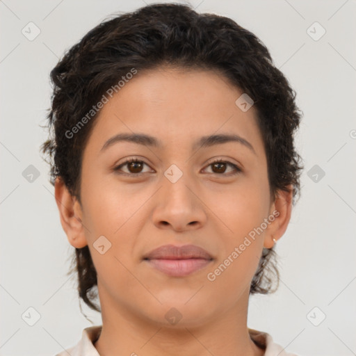 Joyful latino young-adult female with short  brown hair and brown eyes