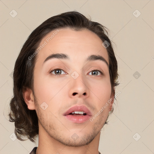 Neutral white young-adult male with medium  brown hair and brown eyes