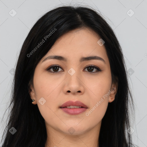 Joyful asian young-adult female with long  black hair and brown eyes