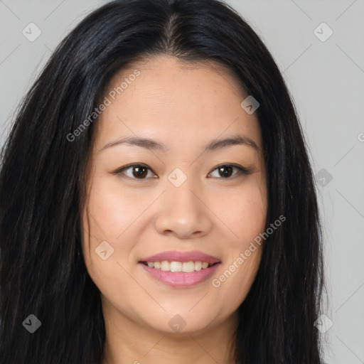 Joyful asian young-adult female with long  brown hair and brown eyes