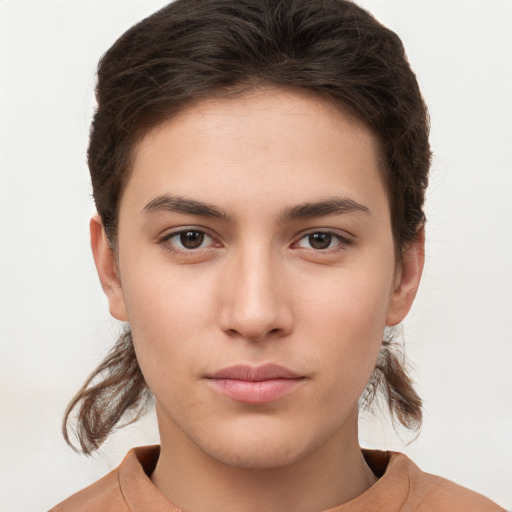 Neutral white young-adult female with short  brown hair and brown eyes