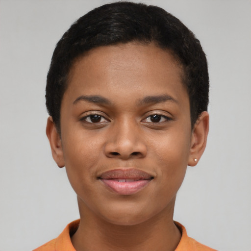 Joyful black young-adult female with short  black hair and brown eyes