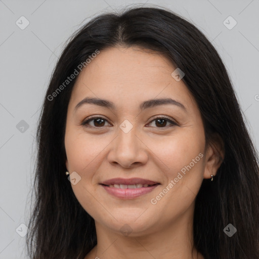 Joyful latino young-adult female with long  brown hair and brown eyes