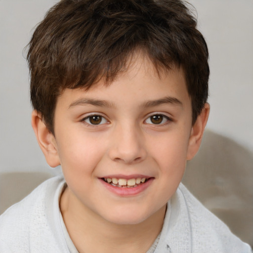 Joyful white child male with short  brown hair and brown eyes