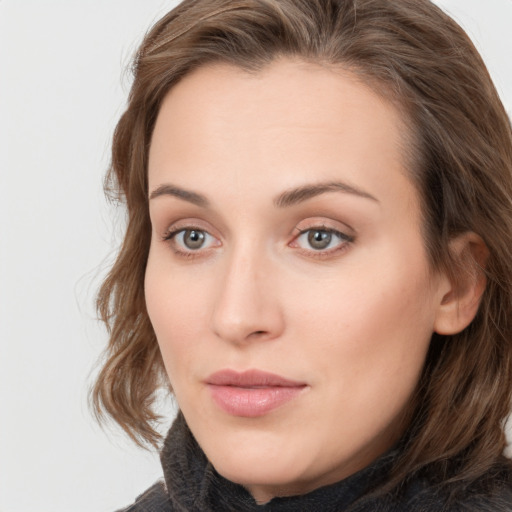 Neutral white young-adult female with long  brown hair and grey eyes