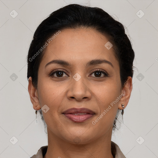 Joyful latino young-adult female with short  brown hair and brown eyes