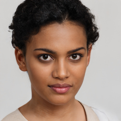 Neutral black young-adult female with short  brown hair and brown eyes