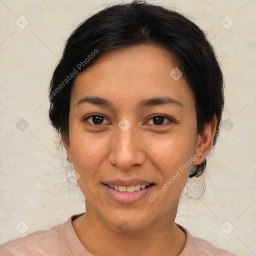 Joyful asian young-adult female with short  brown hair and brown eyes