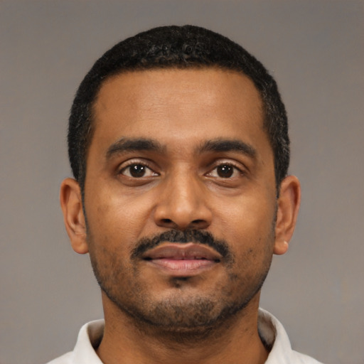Neutral black young-adult male with short  black hair and brown eyes