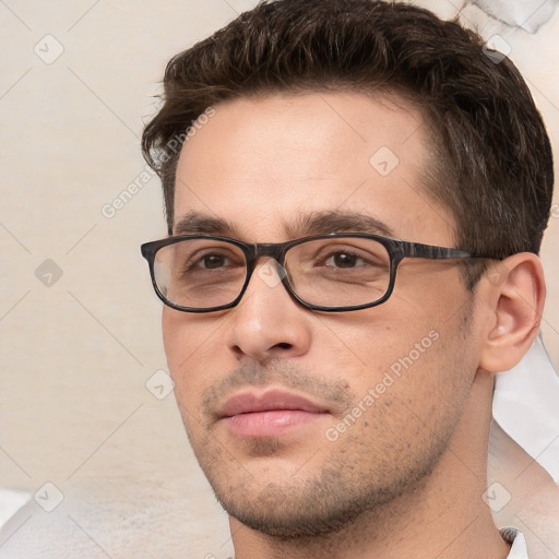 Neutral white young-adult male with short  brown hair and brown eyes