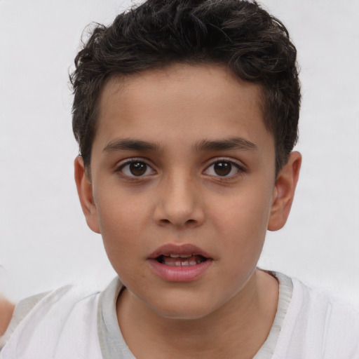 Joyful white child male with short  brown hair and brown eyes