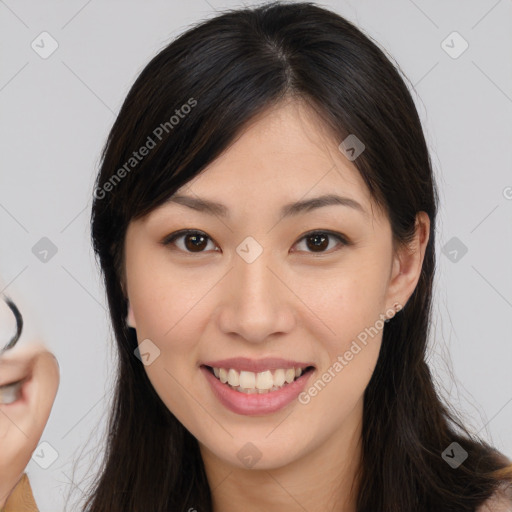 Joyful white young-adult female with long  brown hair and brown eyes