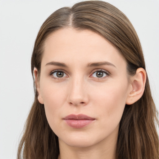 Neutral white young-adult female with long  brown hair and grey eyes