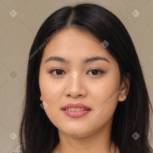 Joyful asian young-adult female with long  brown hair and brown eyes