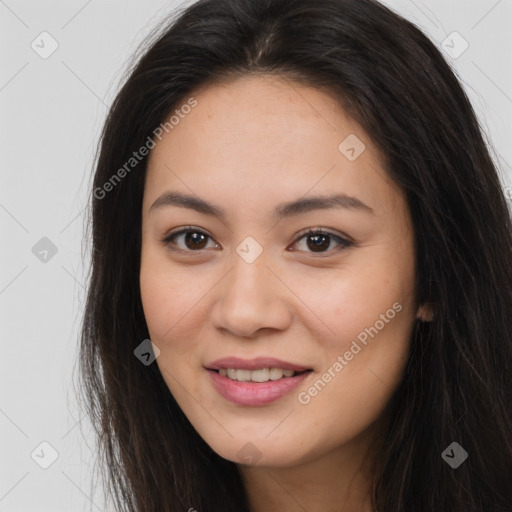 Joyful asian young-adult female with long  brown hair and brown eyes