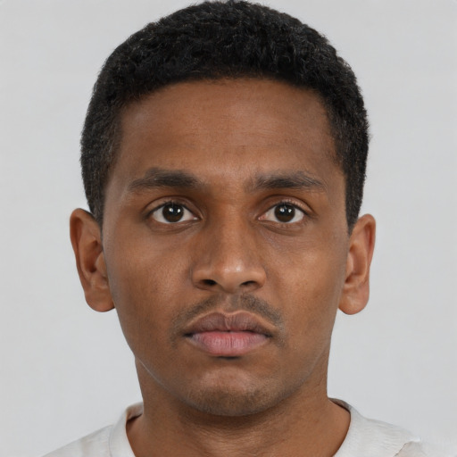 Neutral black young-adult male with short  brown hair and brown eyes