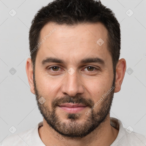 Joyful white young-adult male with short  brown hair and brown eyes