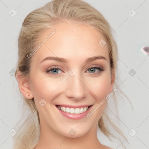 Joyful white young-adult female with medium  brown hair and blue eyes