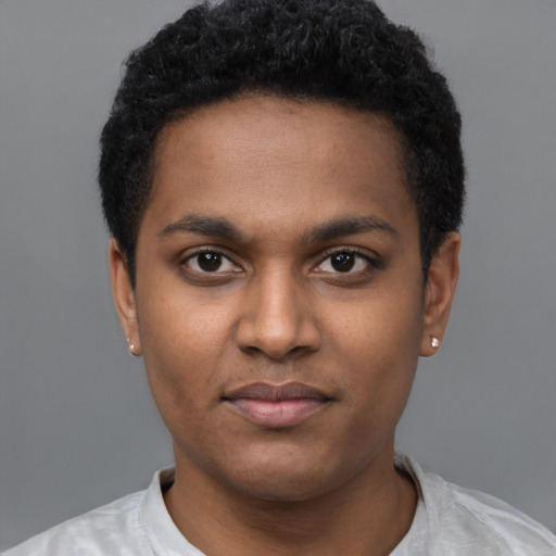 Neutral latino young-adult male with short  black hair and brown eyes