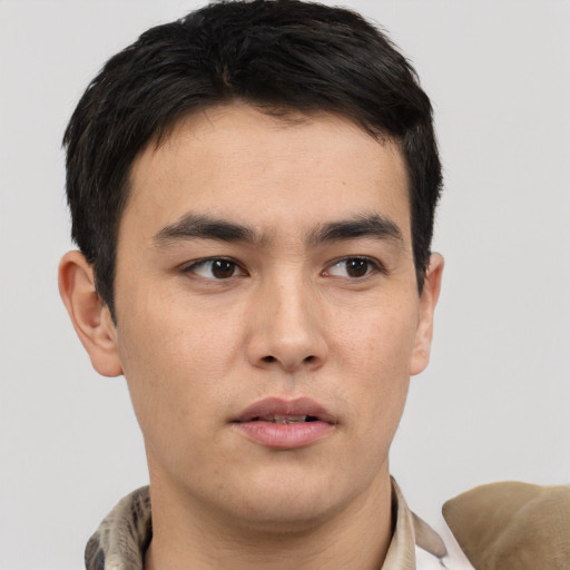 Neutral white young-adult male with short  black hair and brown eyes