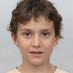 Joyful white child female with short  brown hair and brown eyes