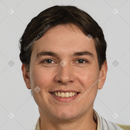 Joyful white young-adult male with short  brown hair and brown eyes