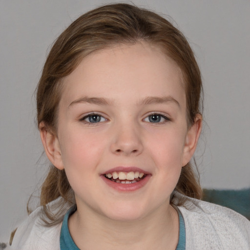 Joyful white child female with medium  brown hair and blue eyes