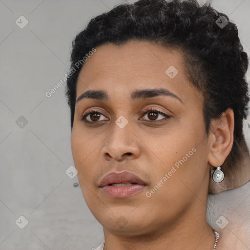 Joyful latino young-adult female with short  black hair and brown eyes